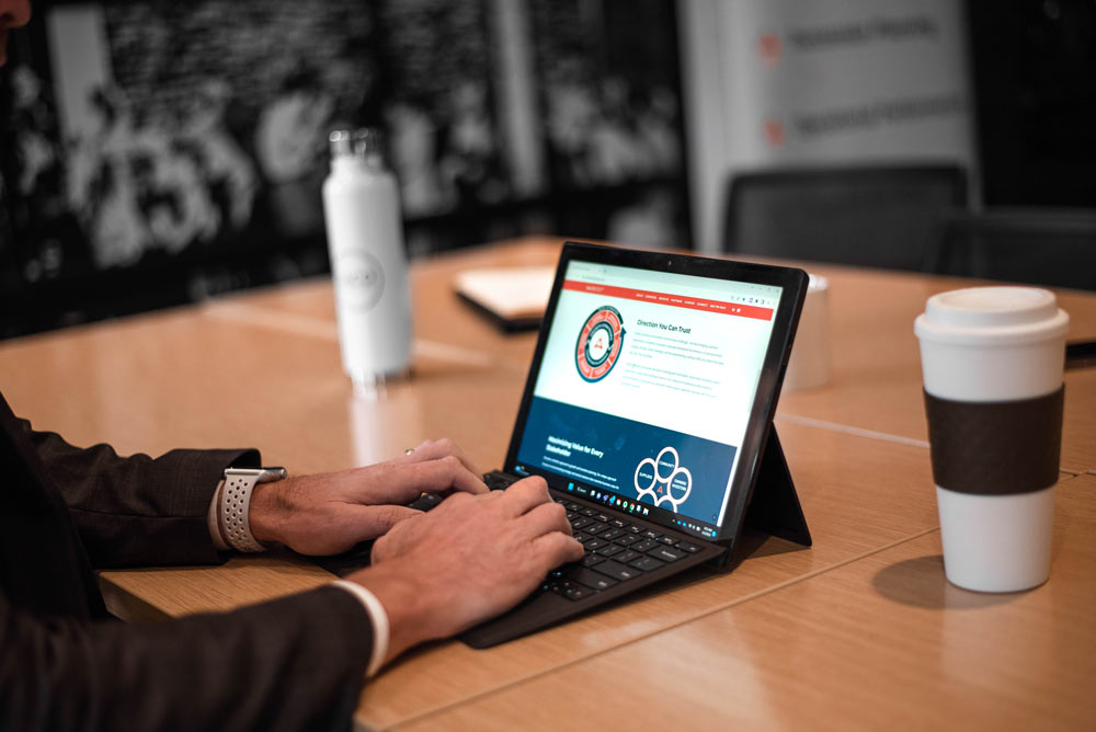 Laptop with Jaco logo displayed