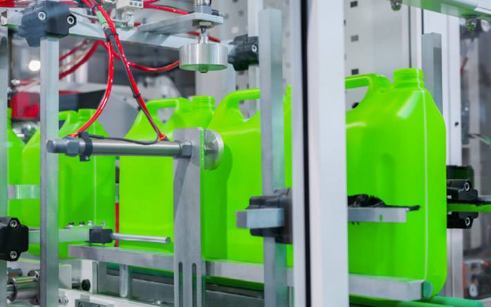 CNC milling machine performing precision metal fabrication work for aerospace and defense manufacturing industry client