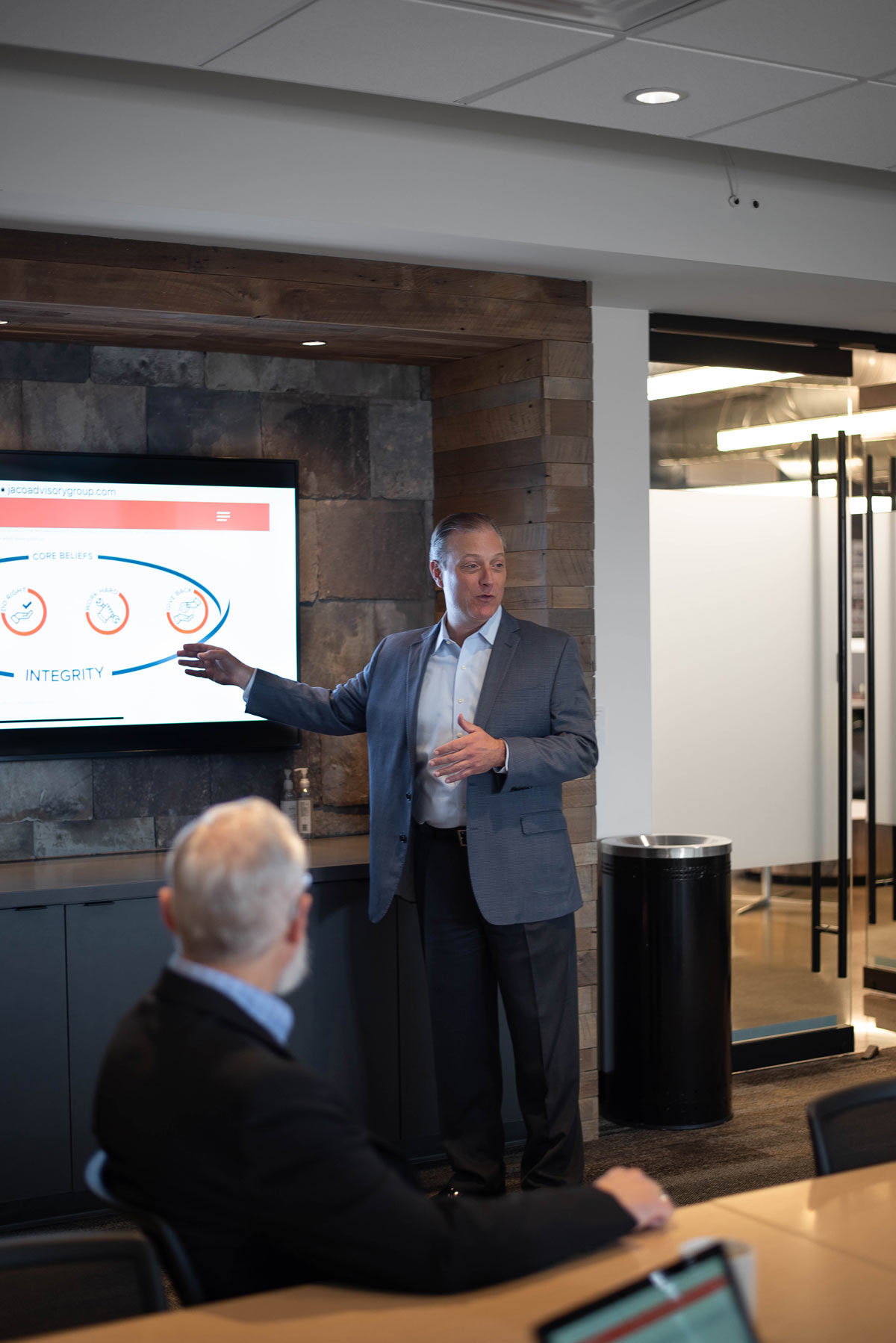 Team member presenting on Protecting Production & Minimizing Exposure